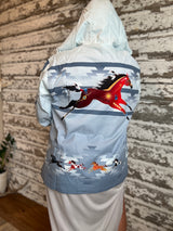 back of silver horse rain jacket